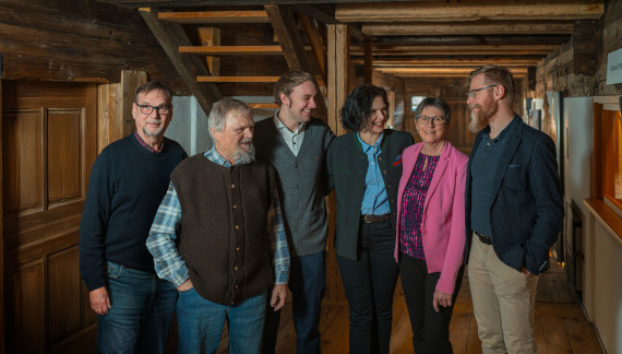 Group photo of the museum staff in the entrance hall