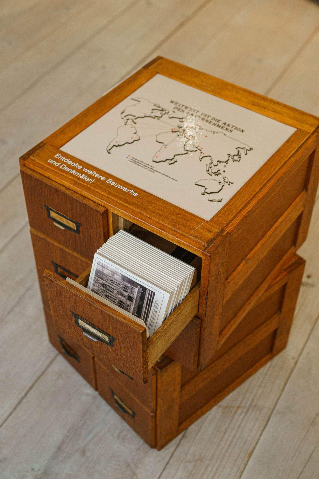 Wooden card index box with open drawer, containing prestigious commissioned works from the Kiefer marble industry
