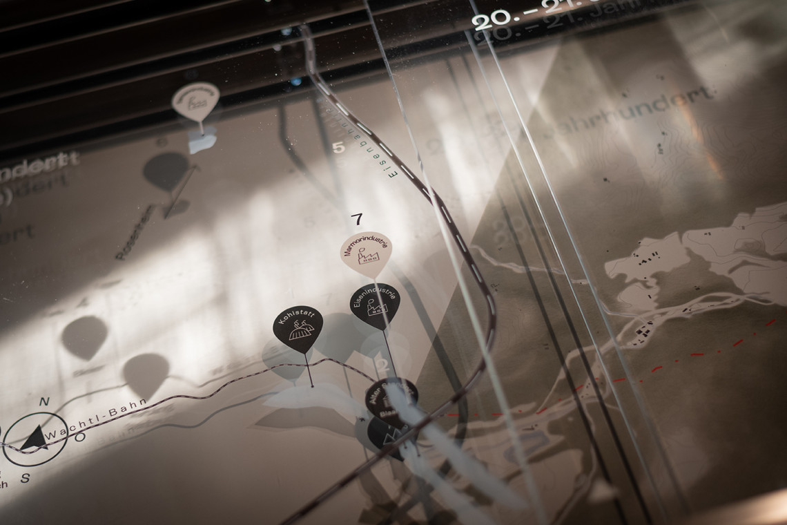 A close-up of the transparent, interactive, multilayered 'Industries of Kiefersfelden' station, which illustrates the different branches by overlapping them vertically.